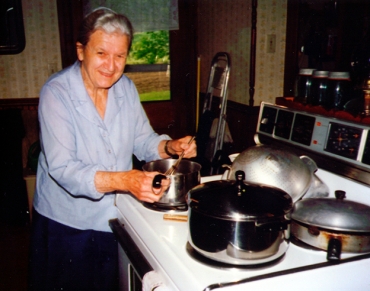 Aunt Ruthie (approx. age 75) busy in the kitchen, 1990s 