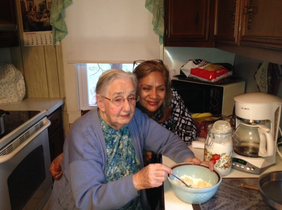 Gloria Araujo In kitchen with Mother (age 95)